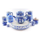Wedgwood and other dark blue Jasperware, decorated with classical figures, floral festoons, etc., in