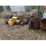 Various scrap items including lawn roll, pillar drill, trolley, grass catcher, and trolleys. NB: Th