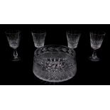 A set of four Waterford Crystal goblets decorated in the Lismore pattern, together with a Galway cut