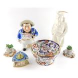 A Jacob Petit porcelain tobacco jar and cover, modelled as a sailor, Minton white salt glazed charac