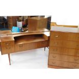 A mid century bedroom suite, comprising a Meredew teak chest of five long drawers, raised on a plint
