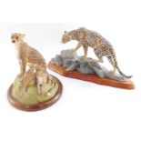 A Harriot Glen design figure group modelled as a cheetah and her cubs, raised on a naturalistic base
