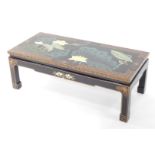 A Chinese black and gilt lacquer coffee table, of rectangular form, the top painted with birds and f