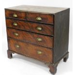 A George III mahogany chest of drawers, with two short and three long drawers with later brass cuppe