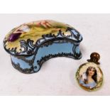 An early 20thC continental porcelain box, the lid painted with a reclining female and Cupid with blu