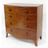 A 19thC mahogany bow front chest of drawers, with two short and three long drawers on bun handles wi