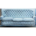 A concave shaped sofa, in blue chequered upholstery, 90cm high, 186cm wide, approx 80cm deep. The u