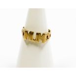 A 9ct gold Mum ring, with pierced design shoulders, ring size M½, 1.6g.