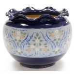 A Doulton Lambeth planter, with flared rim on royal blue body with floral banded decoration, 21cm hi