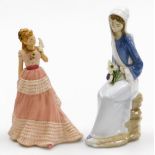 Two porcelain figures, to include a Lladro figure of a lady sat on rocks with lilies, 24cm high and