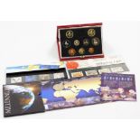 Various coins and first day covers, to include a 1989 cased coin set, a millennium 2000 five pound c
