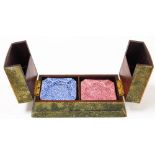 A shagreen smoker's box and contents, comprising Royal Worcester mottled ashtrays, in pink and blue,