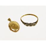 Two items of jewellery, to include a small 9ct gold oval locket bearing initials JG, 2cm high, and a