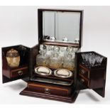 A late 19thC mahogany and rosewood smoker's cabinet or decanter stand, with the top an inlaid shell,