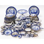 A group of Booths Real Old Willow pattern part dinner wares, to include cake plate, gravy boat and s