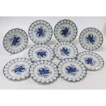 A set of ten Booths blue and white plates, in Worcester style, each with floral fret border and cent