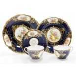 Continental cabinet porcelain, comprising two plates, two cups and one saucer, all with hand painted