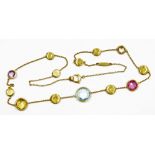 An 18ct gold necklet, set with faceted mixed gem stones to include quartz and tourmaline from the Ja