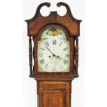 W Davies. A 19thC oak longcase clock, the painted arch dial, eight day movement with date dial, in a