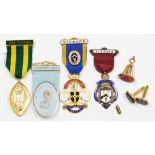 A group of Masonic items, to include four assorted Masonic jewels, a guild medal and an agate seal,