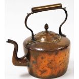 A Victorian copper kettle, 35cm high.