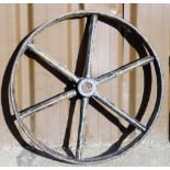 A cast iron wheel, 57cm diameter.