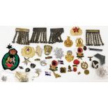 A group of jewellery and effects, cap badges, bar brooches, silver plated uniform chains, etc. (a qu