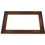 A 1920/30's oak framed rectangular wall mirror, with button and ball detail, 72cm x 45cm.