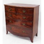 A 19thC bow front flamed mahogany chest of drawers, with two short and three long drawers with brass