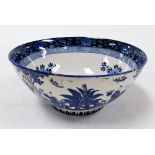 A Booths Silicon ware Ming bowl, in blue and white pattern with Oriental type design and Booth stamp