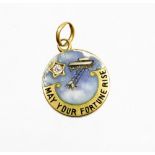 An early Edwardian bi-plane enamel pendant, with bi-plane detailing inscribed 'may your fortune rise