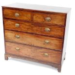 A George III mahogany chest of drawers, with a moulded edge, above two short and three long drawers,