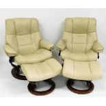 A pair of cream Stressless armchairs and footstools, 102cm high, 63cm wide, 70cm deep.