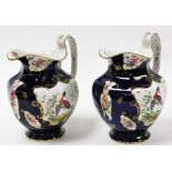 Two early 20thC Booths wash jugs, each in Royal blue with gilt detailing and Asiatic pheasants and l