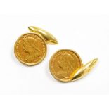 A pair of Victorian half gold sovereign cufflinks, dated 1896, in yellow metal frames, unmarked, 12.