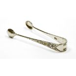 A pair of Victorian silver sugar nips, with engine turned floral detailing, London 1888, ½oz.