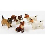 A group of Beswick animal ornaments, to include two corgis, a bulldog, terrier and a seated fox. (5)