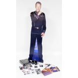 A group of Babylon Five memorabilia, to include a large cardboard cut out, security clearance badges