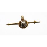 A Royal Marines sweetheart brooch, with central globe emblem surrounded by the Royal Marines figure,