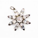 A moonstone star pendant, the star shaped pendant with various imitation moonstones, in claw setting