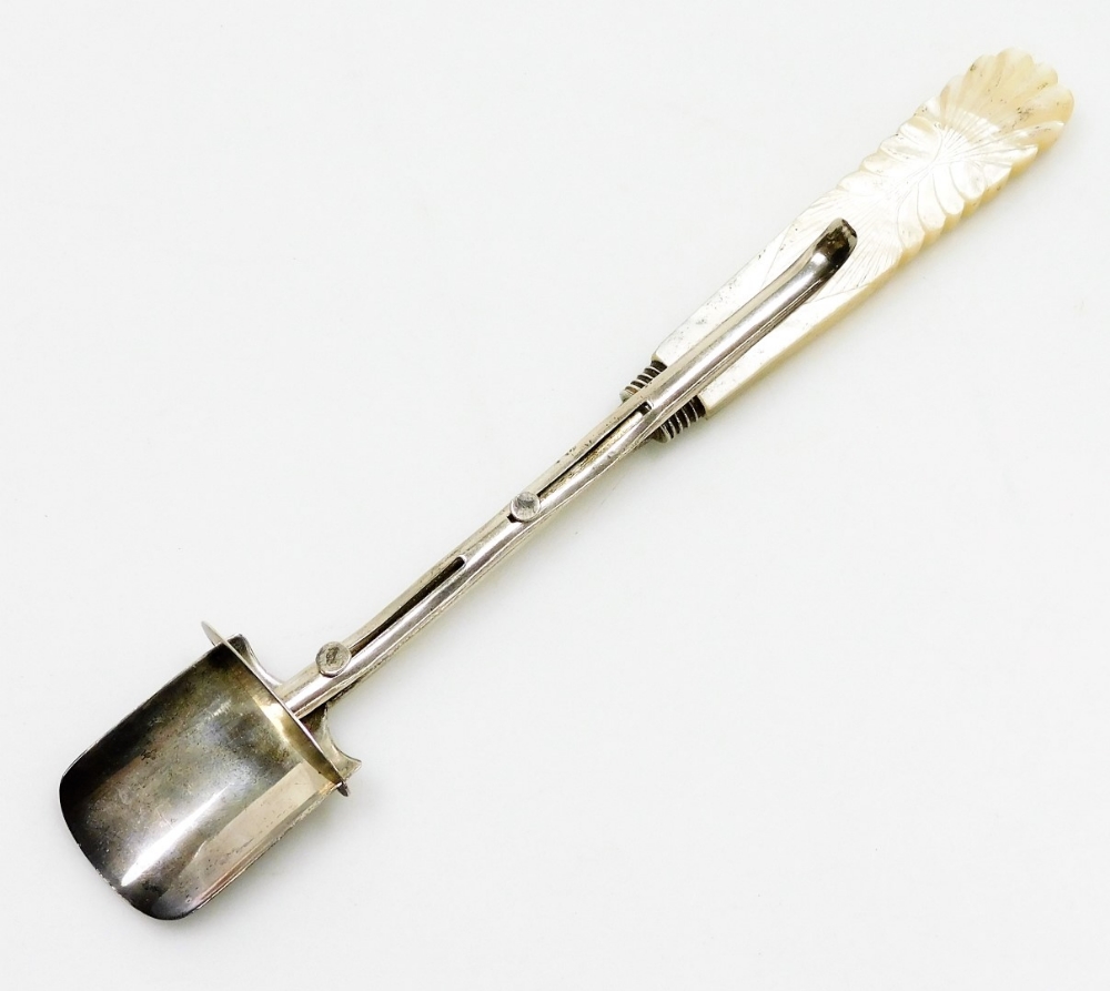 A William IV silver cheese scoop, with patent sliding action and carved mother of pearl handle, Birm