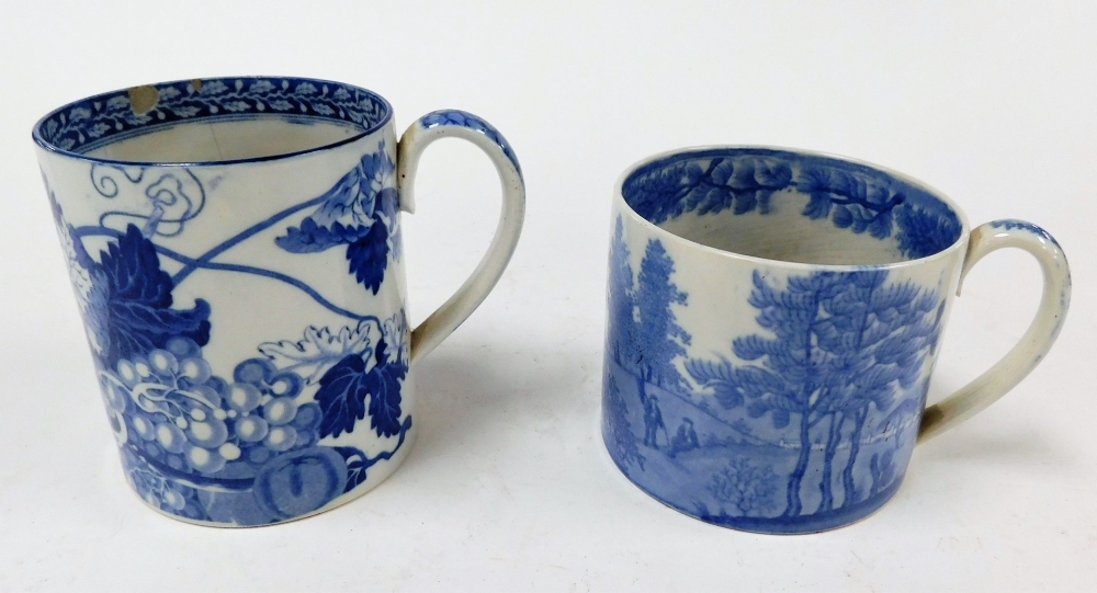 A large 19thC Pearlware mug, with blue and white transfer landscape and figure decoration, 9cm high,