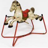 A Mobo Prairie King rocking horse, on metal frame base, 92cm high, 94cm wide, 53cm deep.