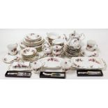 A Royal Albert Lavender Rose pattern part tea and dinner service, comprising dinner plates, side pla