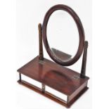 A mahogany dressing table mirror, with oval mirror plate on two stand supports, with two mirrored fr