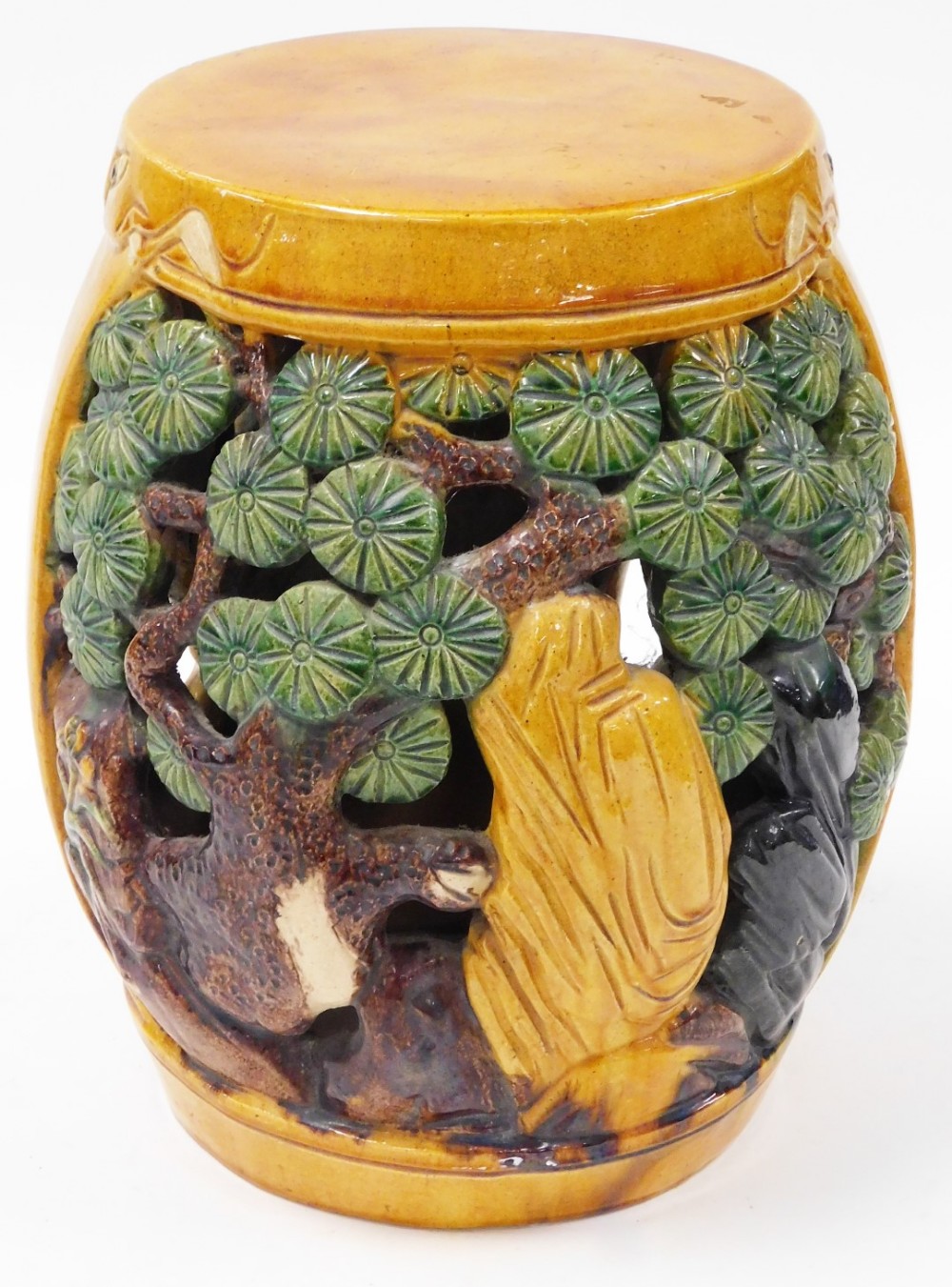 An early 20thC yellow green and brown glazed Chinese barrel seat, decorated with lions and trees, un - Image 2 of 2