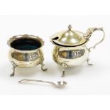 Two silver salts, to include an Oxford silver salt with flared rim on tripod shelf feet, Chester 184