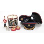 A group of Royal Engineers caps and memorabilia, to include a drum decanter, model of a Royal Engine