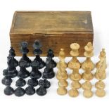 A wooden chess set, unmarked in wooden fitted case.