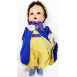 An Armand Marseille bisque headed doll, numbered 518042, with painted face and limbs, in a blue and